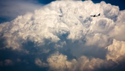 Amazing Majestic Clouds and Airplane