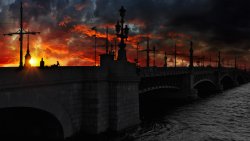 Amazing Red Sunset and People on the Bridge