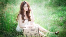 Beautiful Asian Girl on the Grass