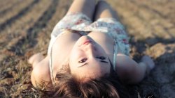 Beautiful Girl Lying on the Ground