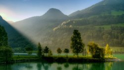 Beautiful River in Mountain Valley and Green Forest