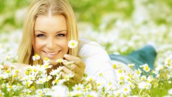 Beautiful Smiling Happy Girl with White Flowers