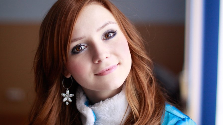 Beautiful Smiling Teen Girl with Red Hair