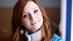 Beautiful Smiling Teen Girl with Red Hair