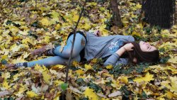 Beautiful Teen Girl in the Autumn Forest