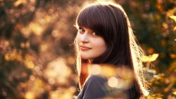 Beautiful Teen Smiled Girl in the Autumn Park