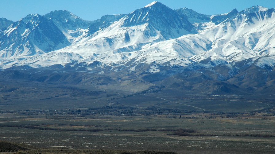 Big Snowcapped Mountains and Valley