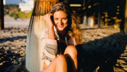 Blonde Smiling Girl on the Beach