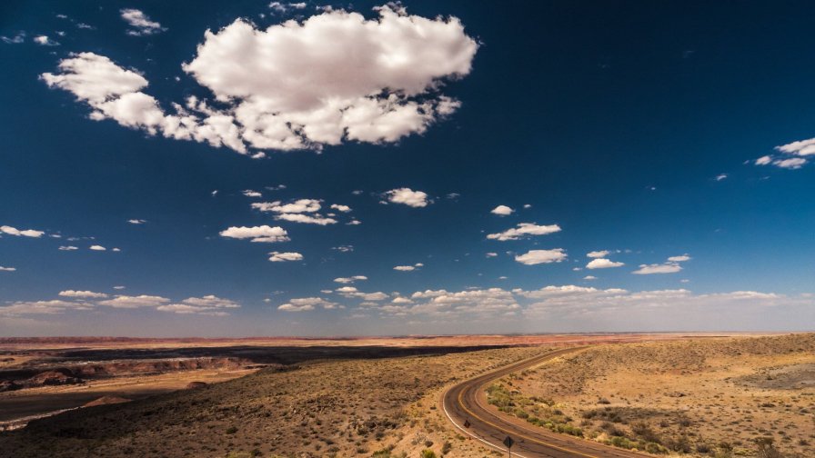 Dead Desert and Clouds in Sky