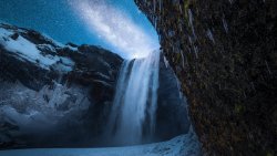 Frozen Waterfall in Mountain Valley