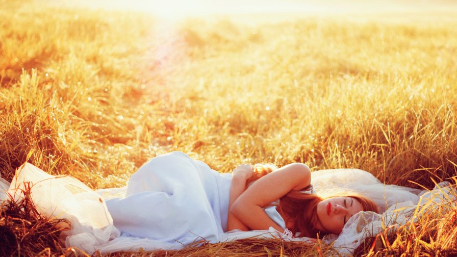 Girl Sleeping on the Field