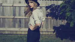 Glamour Girl in Black Dress and Hat