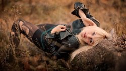 Glamour Gothic Blonde Girl with Perfect Green Eyes