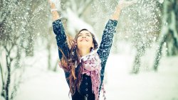 Happy Smiling Young Girl and Snow