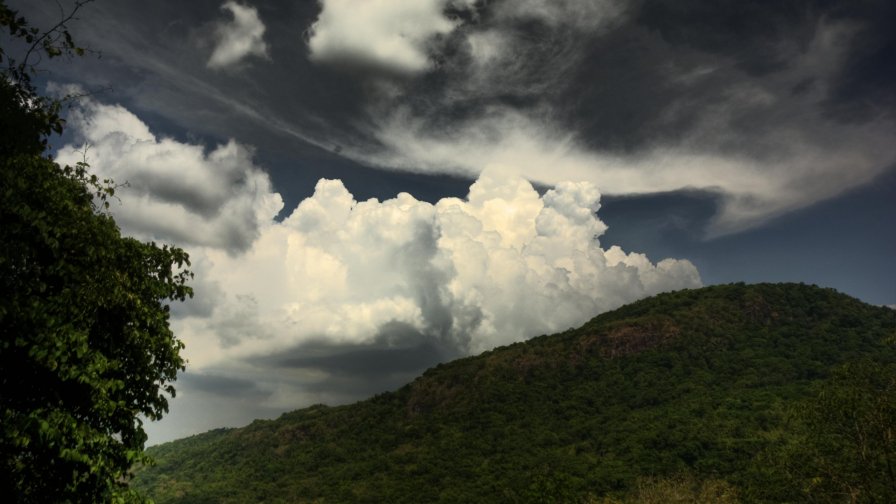 Hill and Clouds in Sky Greenery Landscape