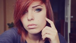 Lana Branishti Beautiful Girl with Piercing Blue Eyes and Red Hair
