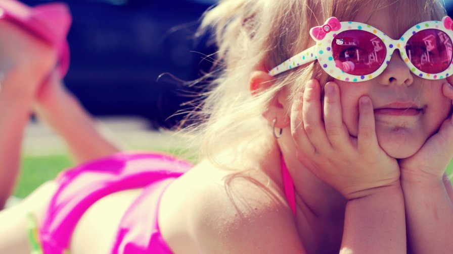 Little Girl with Pink Sunglasses