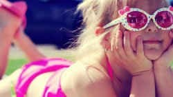Little Girl with Pink Sunglasses