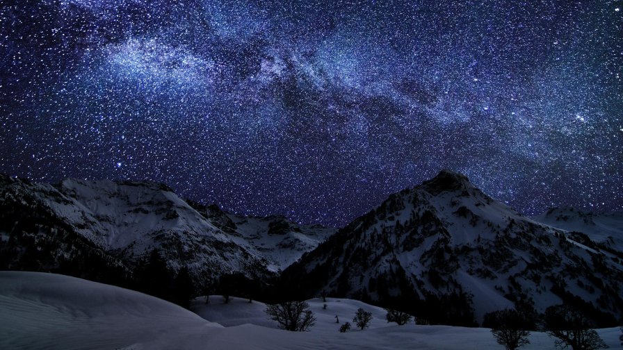 Night Winter Mountains and Milky Way on the Sky