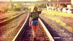 Pretty Brown Girl Walks on Railway