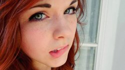 Pretty Teen Girl with Red Hair and Green Eyes