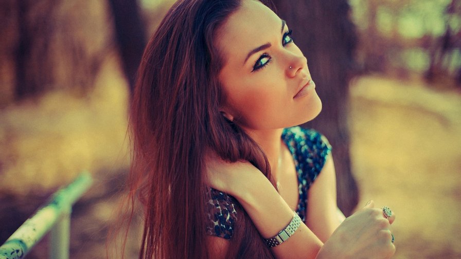 Pretty Young Brunette Girl in the Park