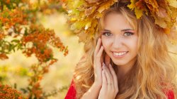 Pretty Young Smiling Blonde Girl with Leaf Wreath