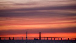 Red Sky with Clouds and Bridge