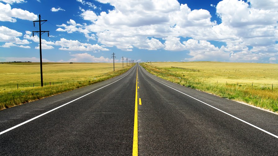 Road in the Field and Clouds in Sky