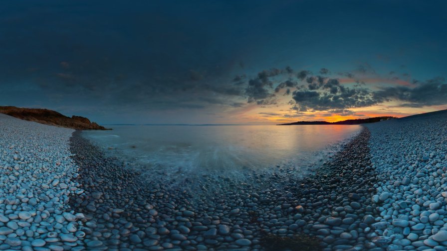 Rocks on the Beach and Beautiful Sunset