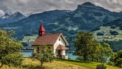 Small Church and Village in the Mountain Valley