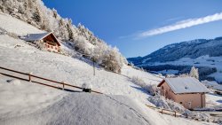 Snow Covered Village in Mountains