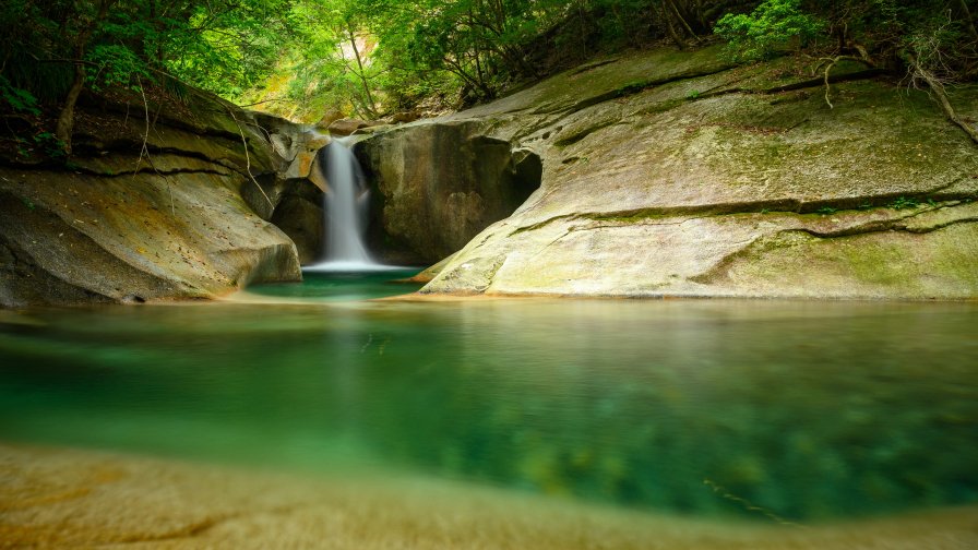 Beautiful Waterfall and Lake in Rocks