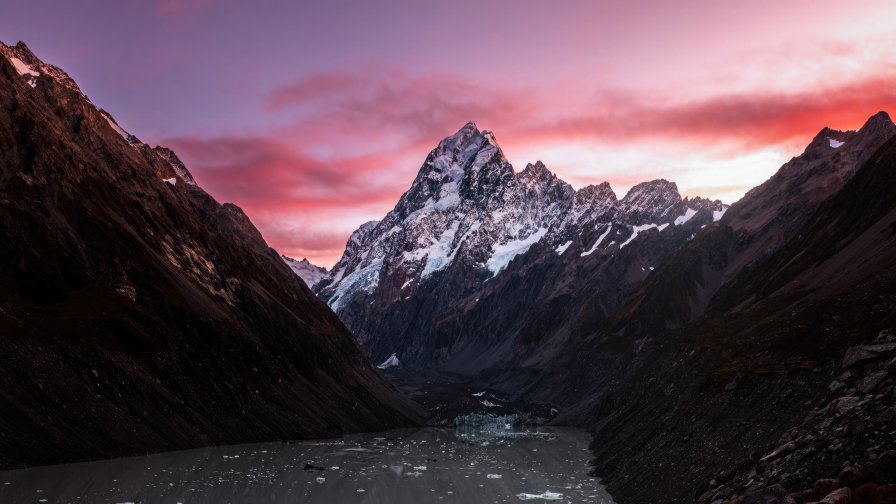 Snowed Mountains Peaks and Lake