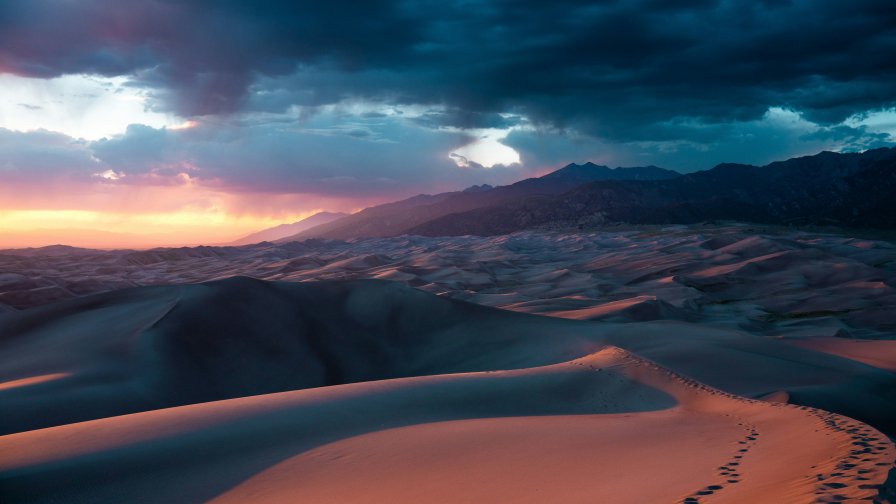 Sun Setting over Sand Dunes