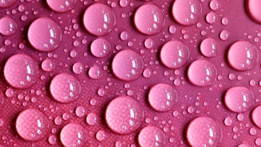 Water Drops on Pink Surface